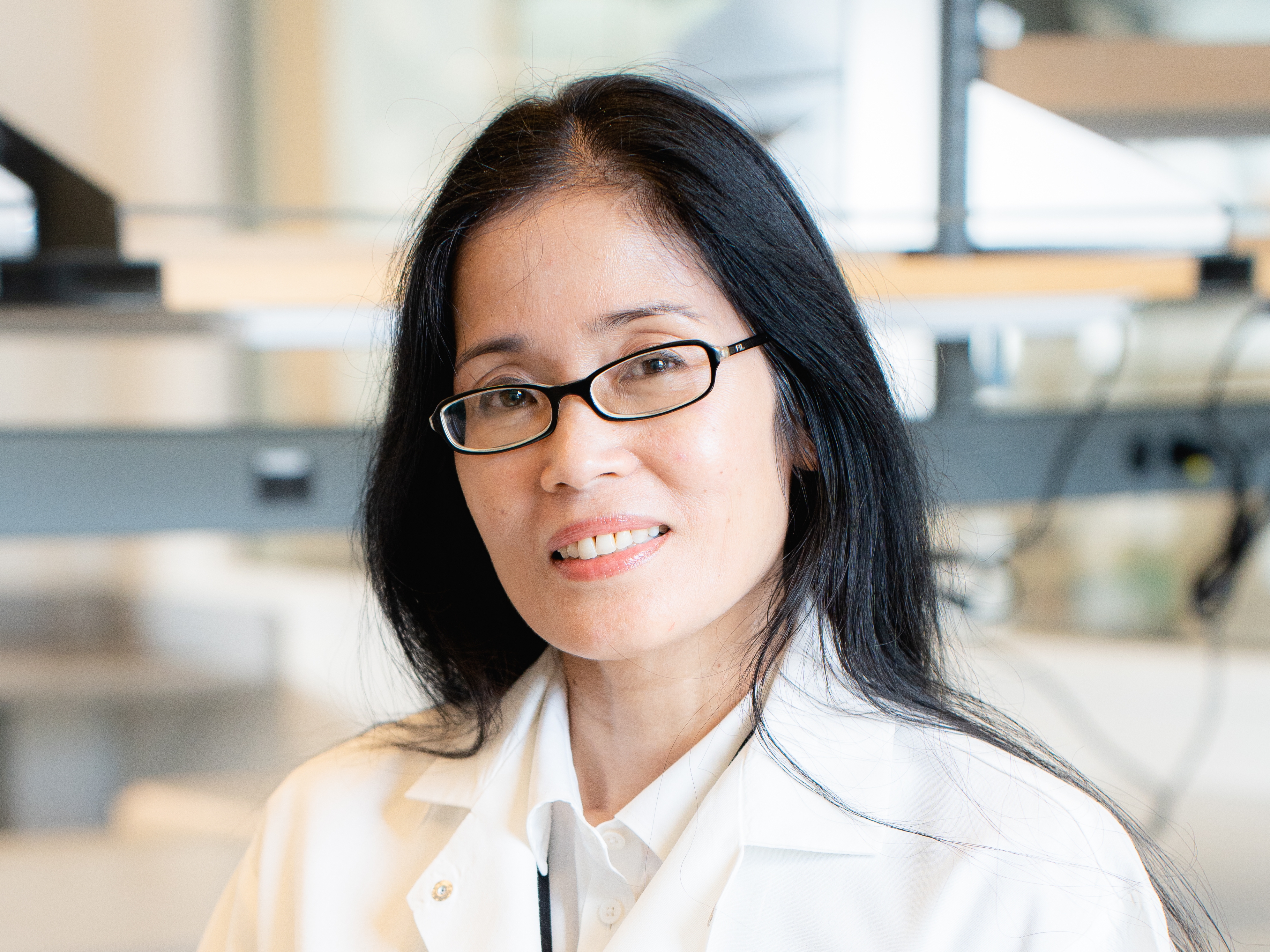 Close-up of Julie Engers wearing a lab coat.