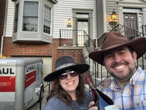 Photo of man and woman moving into a condo.