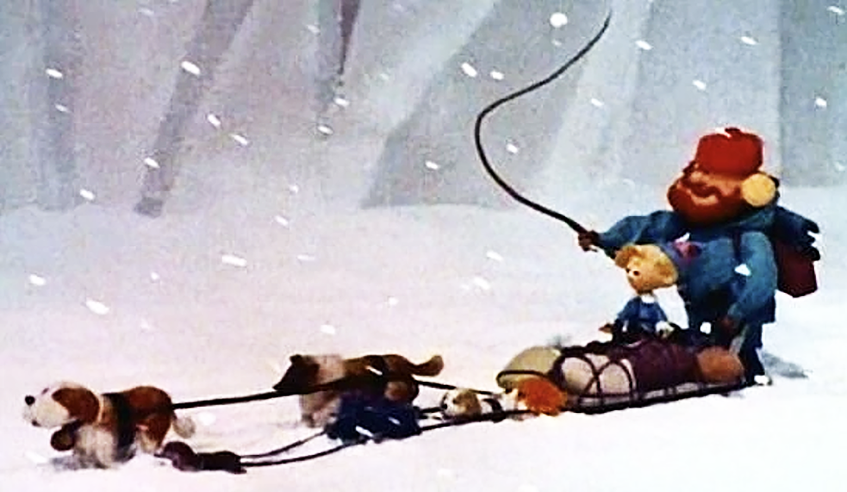 The prospector Cornelius and his team of sled dogs. Hermey is on the sled with Cornelius.