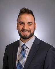 Man in a suit and tie. Headshot.