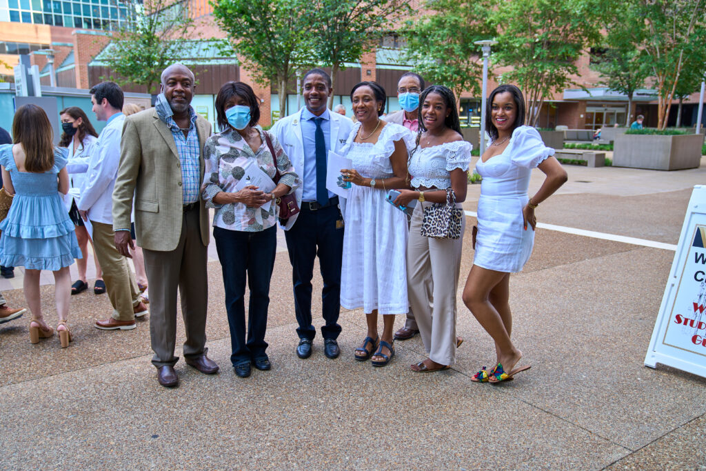 A family from Haiti stands outside Vanderbilt University Hospital