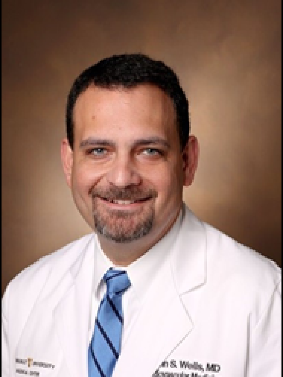 Quinn Wells, Pharm.D., M.D.