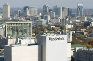 Vanderbilt University research buildings sit in the foreground of the city skyline