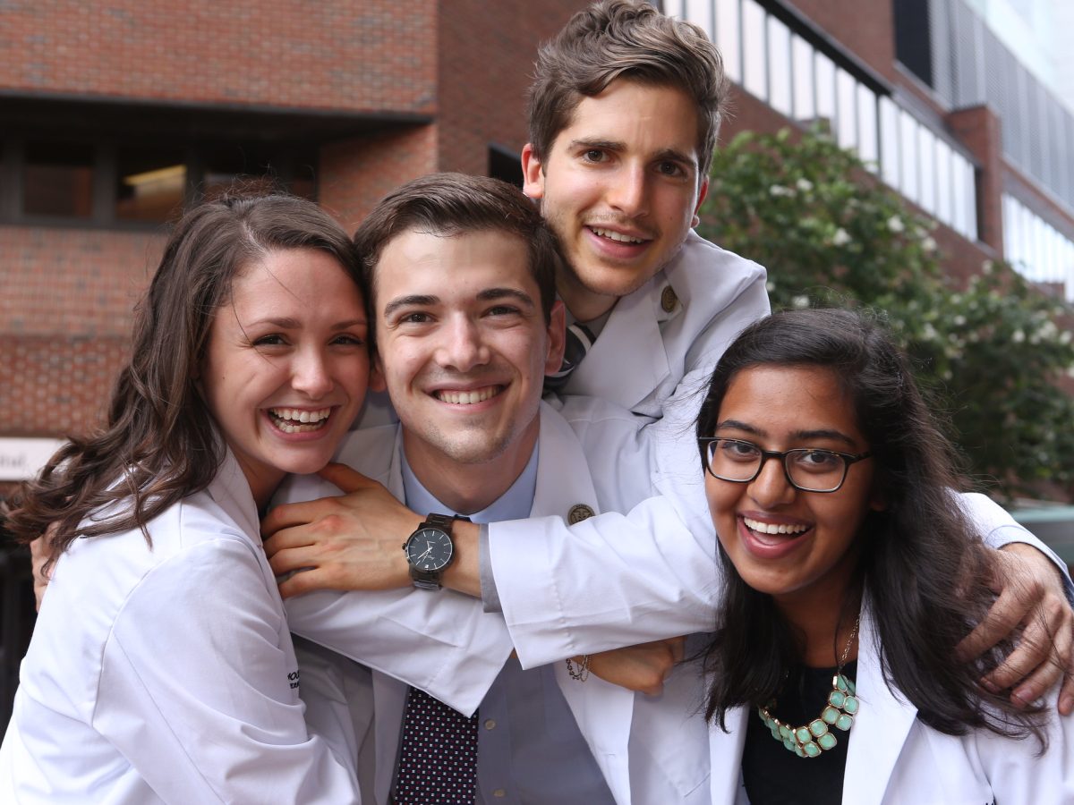 Students in white coats