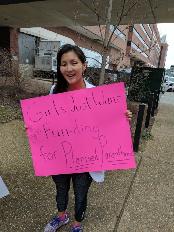 Eileen with sign.jpg