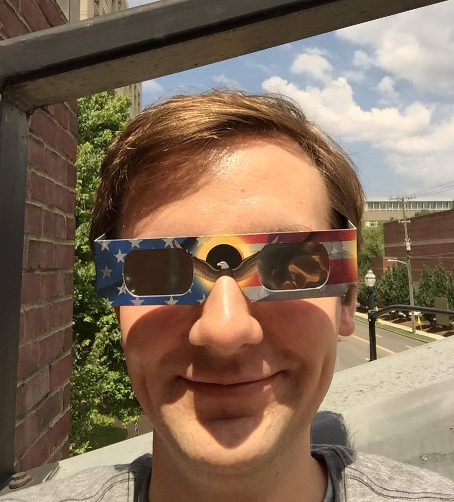 Matt in eclipse glasses.jpg